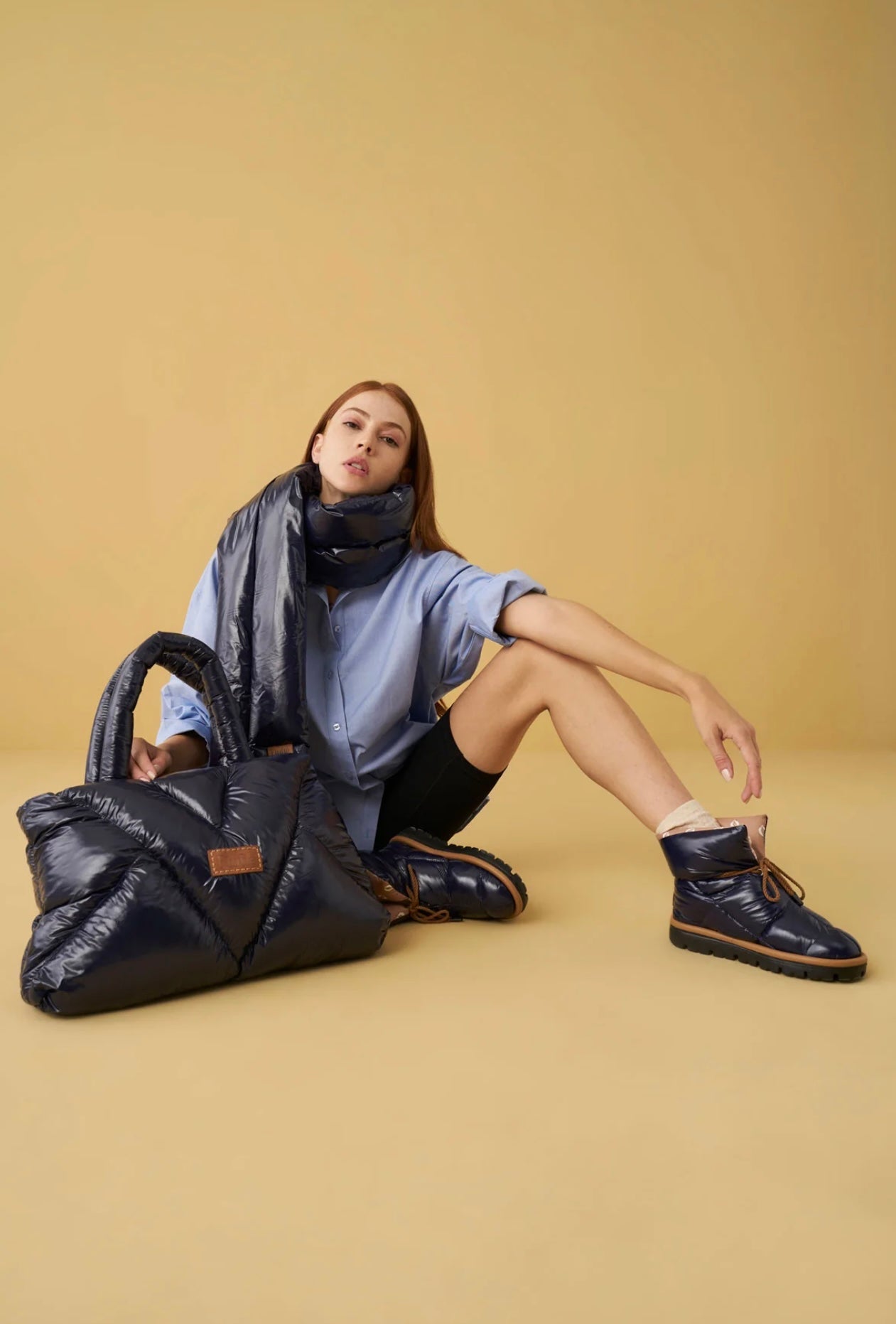 Shiny navy pillow boots